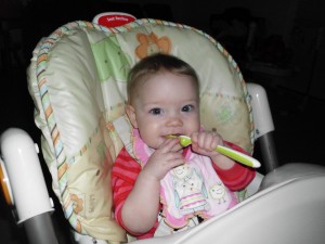 Riley enjoying homemade baby food